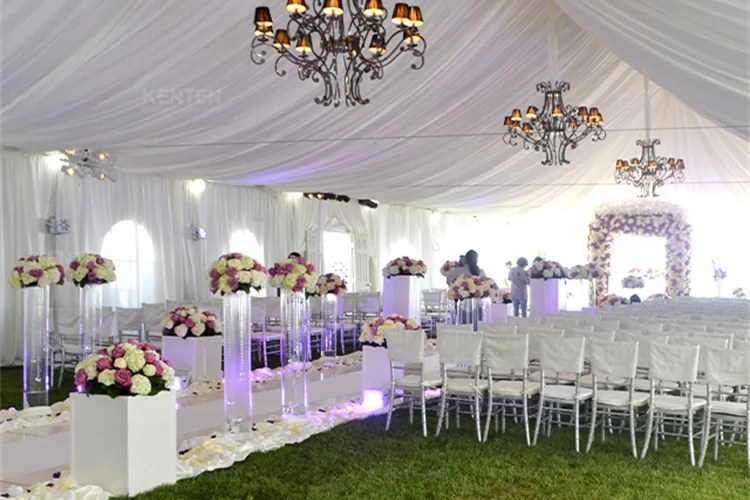 Luxurious white wedding tent for outdoor ceremonies and receptions