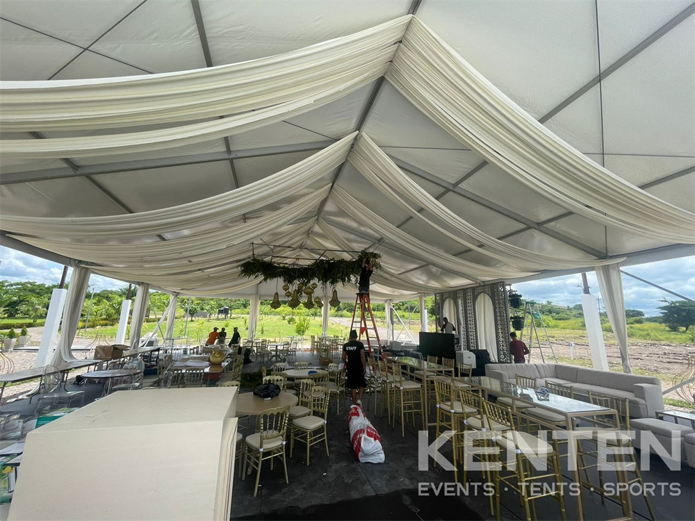 Party rental tent with rood curtains